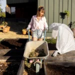woman works on her backyard garden 2024 05 20 21 44 49 utc